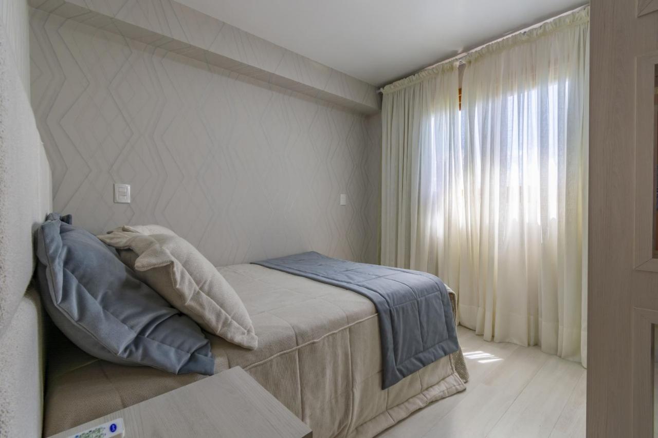 Rosa Edificio Solar Da Encosta Apartment Gramado Bagian luar foto